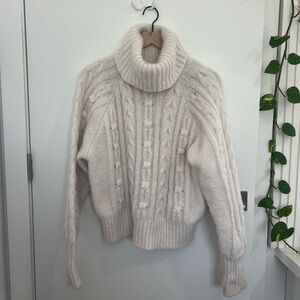 Cableknit sweater
